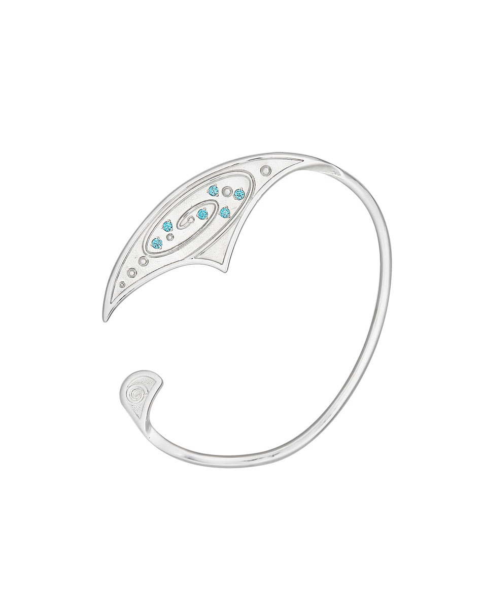 Sterling silver galaxy ear cuff with blue cubic zirconia on white background