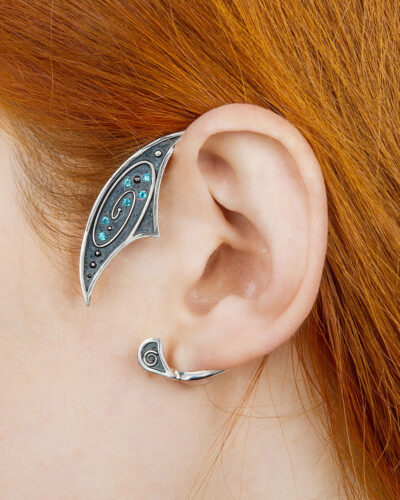Galaxy ear cuff in sterling silver with blue stones worn on ear
