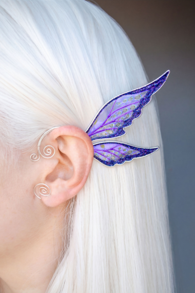 Purple handmade fairy ear cuff worn on white-haired model, no piercing needed cosplay jewelry