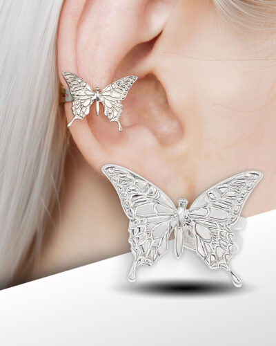 Silver butterfly ear cuff on model’s ear