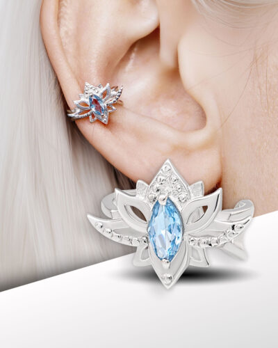 close-up of lotus ear cuff worn on ear