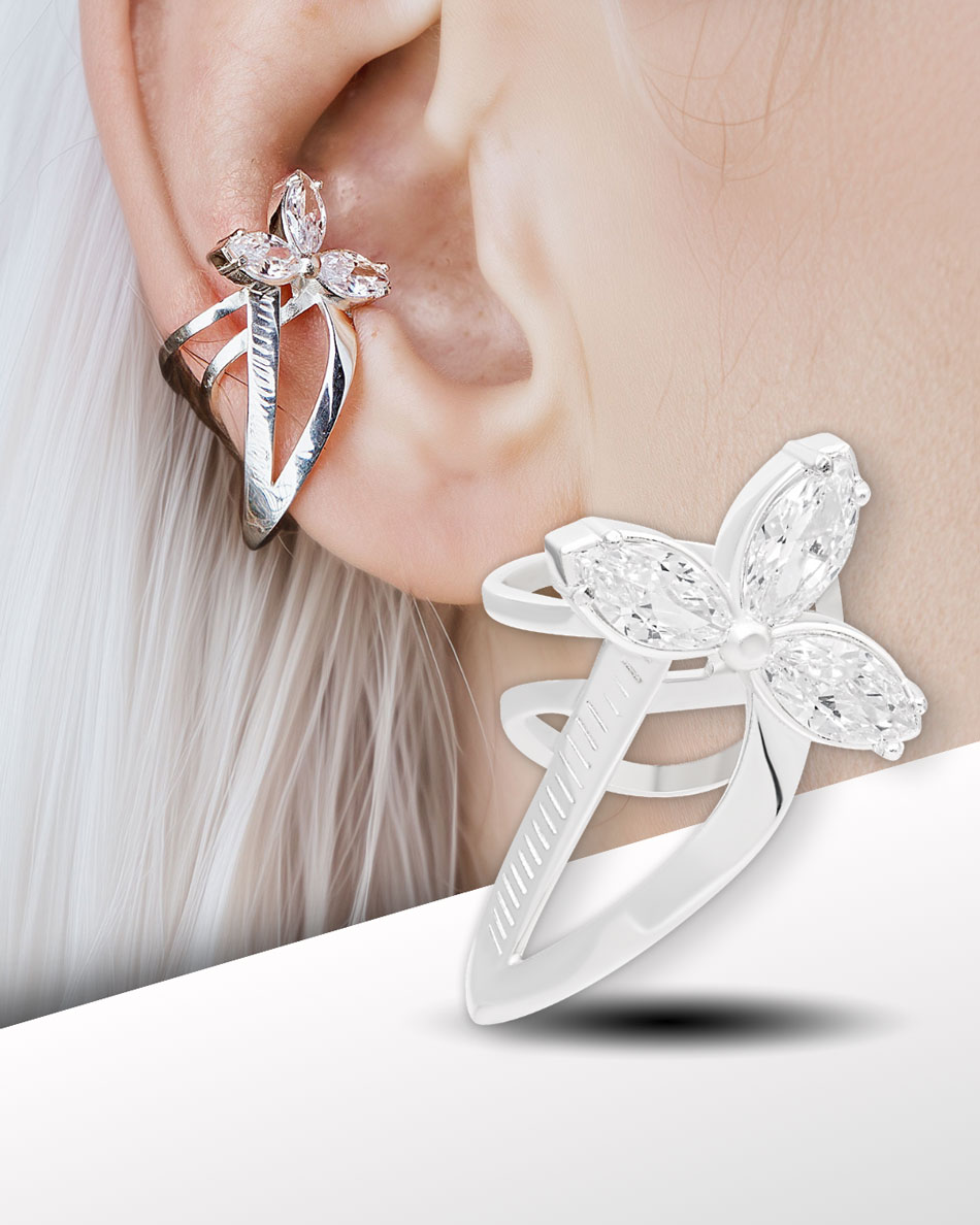 Elven ear cuff on model’s ear with clear stones