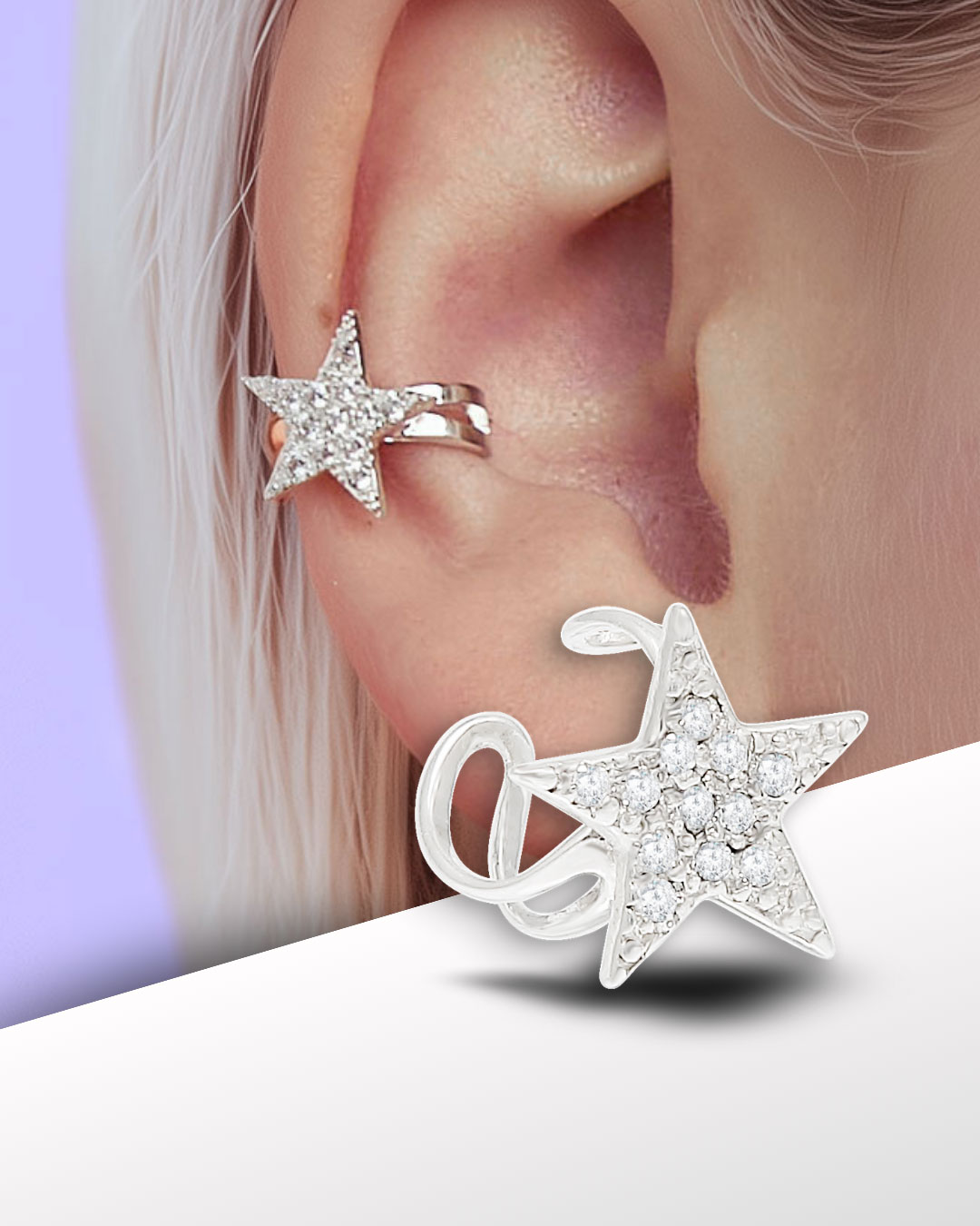Silver star ear cuff with clear zirconia worn on middle of ear, shown on model with short brown hair and orange background.