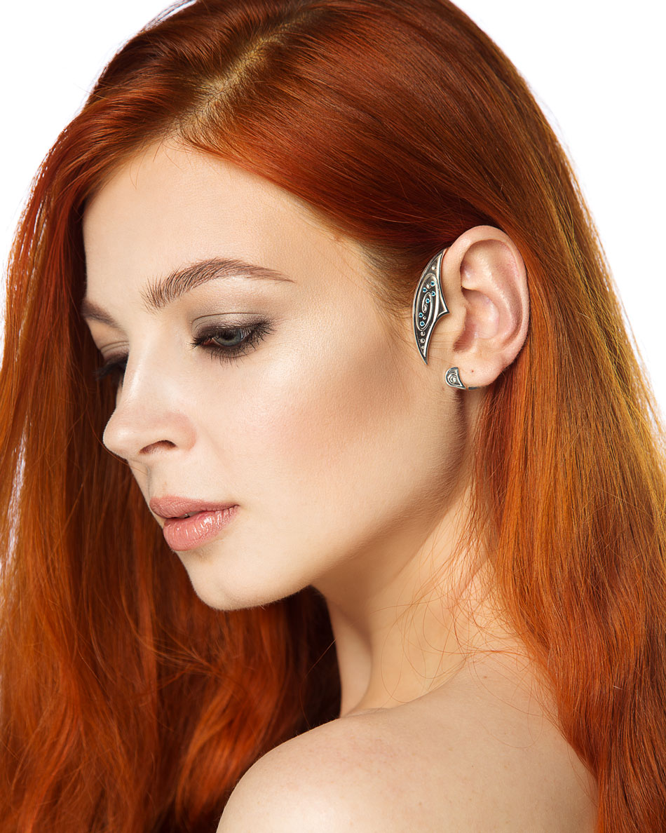 Close-up of galaxy ear cuff on model with red hair