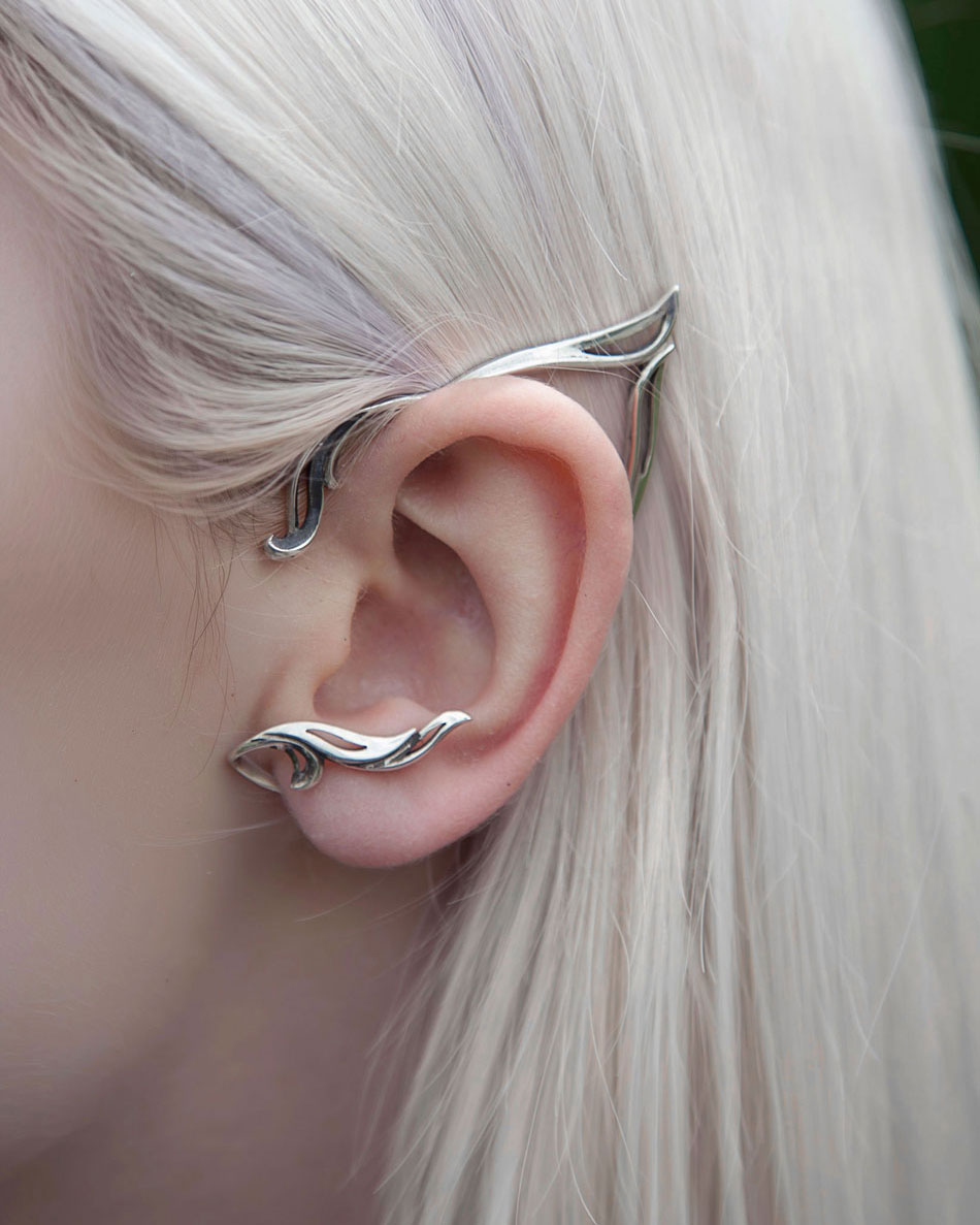 Close-up of silver elf ear cuff on ear