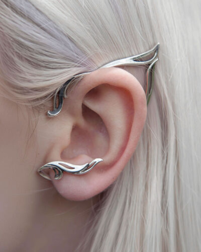 Detailed view of oxidized silver elf ear cuff on model
