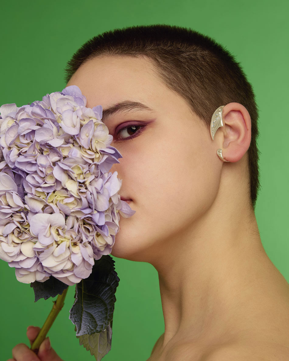 model wearing galaxy ear cuff with blue stones – 925 sterling silver wrap on short hair