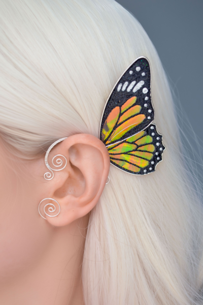monarch butterfly ear cuff on blonde model, handmade no-piercing fairy cosplay earring