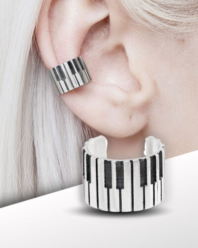 piano ear cuff close-up on ear, sterling silver wide cuff with piano keys
