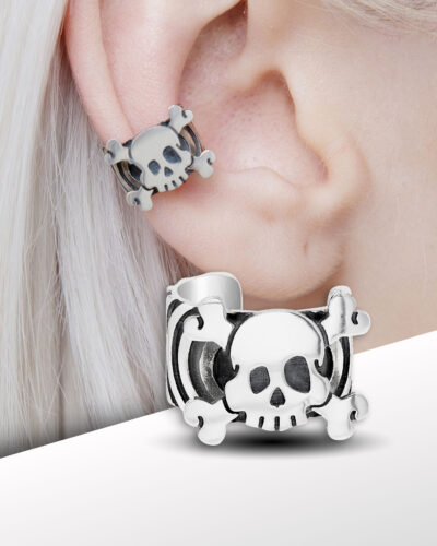 close-up of skull ear cuff on ear, no piercing