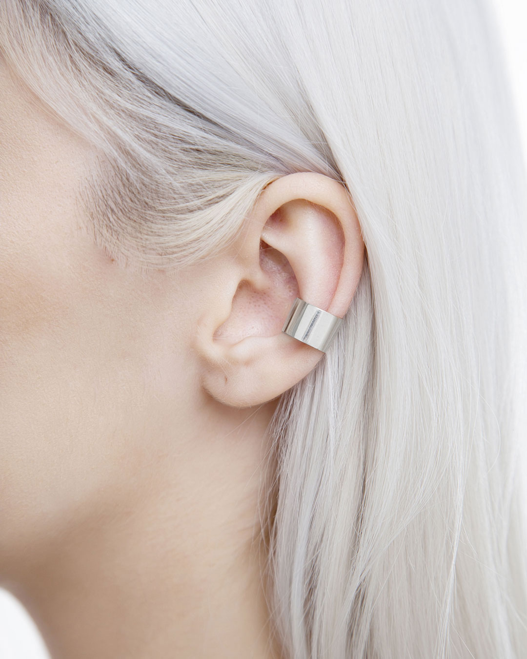 sterling silver wide ear cuff shown on ear