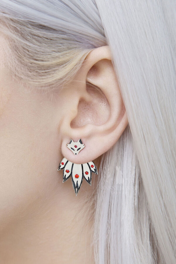 Sterling silver fox ear jackets with red cubic zirconia stones, worn on ear, kitsune design