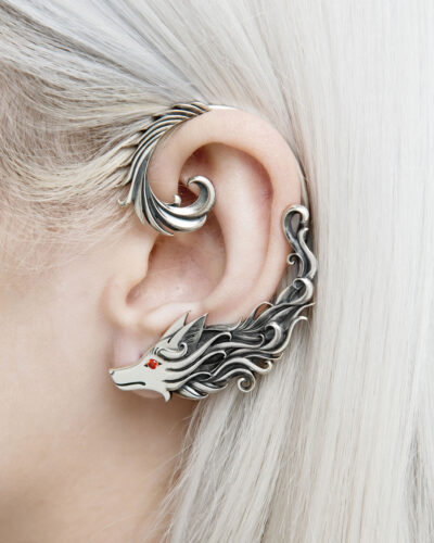 Close-up of silver wolf ear cuff with adjustable top part