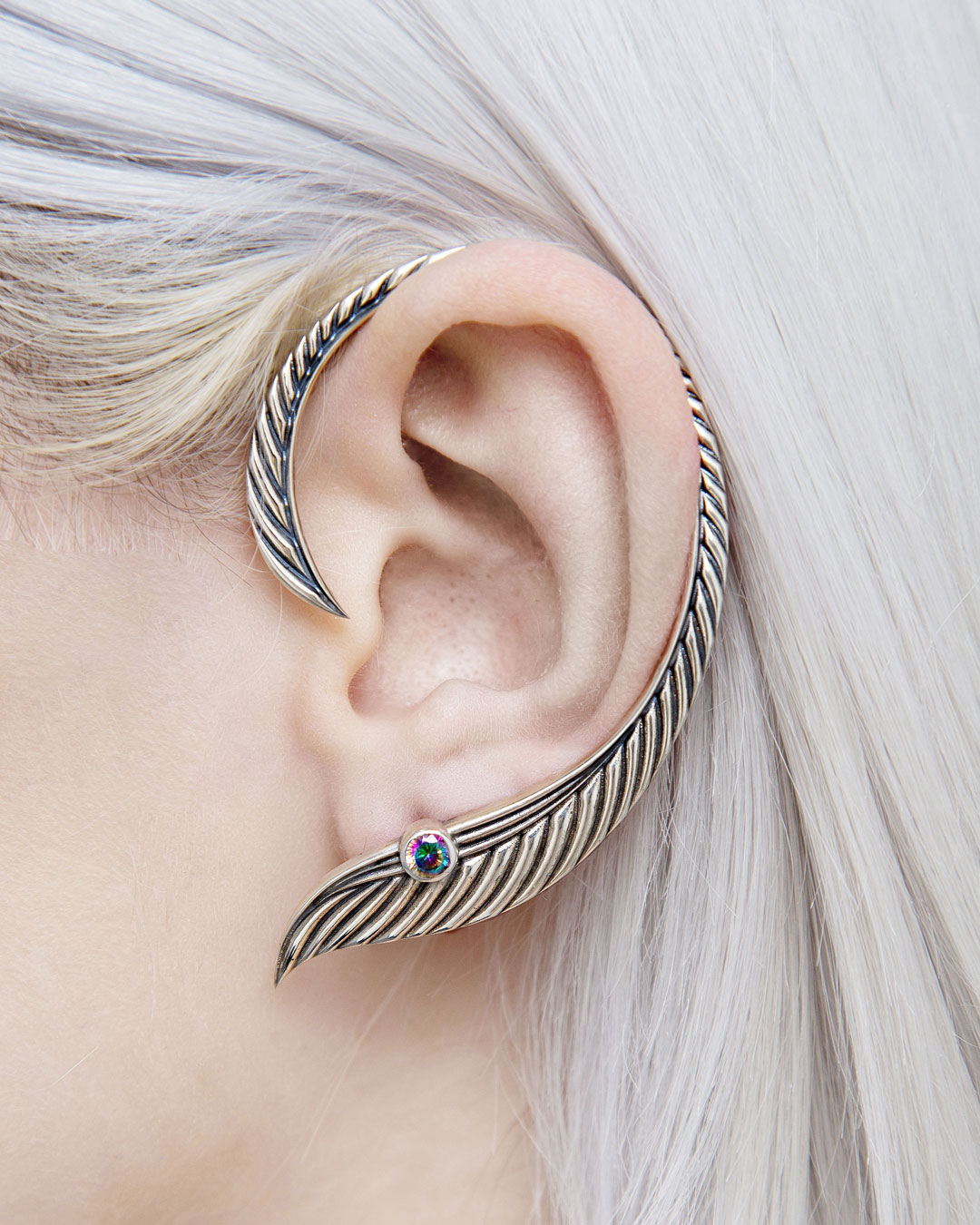 Elven ear cuff with stone on model’s ear