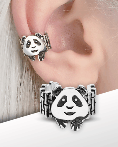 Silver panda ear cuff on model’s ear close-up